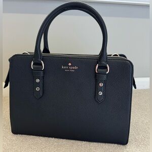 New without tags. Kate Spade satchel purse with shoulder strap.